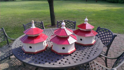 Trio of painted cedar bird houses