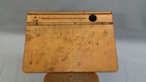 Top view of desk lid before restoration