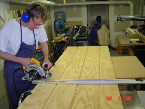 Cutting T1-11 panels to size with circular saw