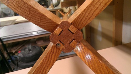Legs attached to base via mortise and tenon joints