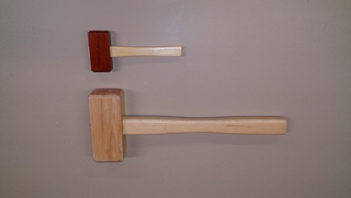 The mini mallet is approximately 1/2 the size of a full size mallet