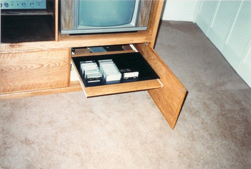 Pull-out tray to store cassette tapes