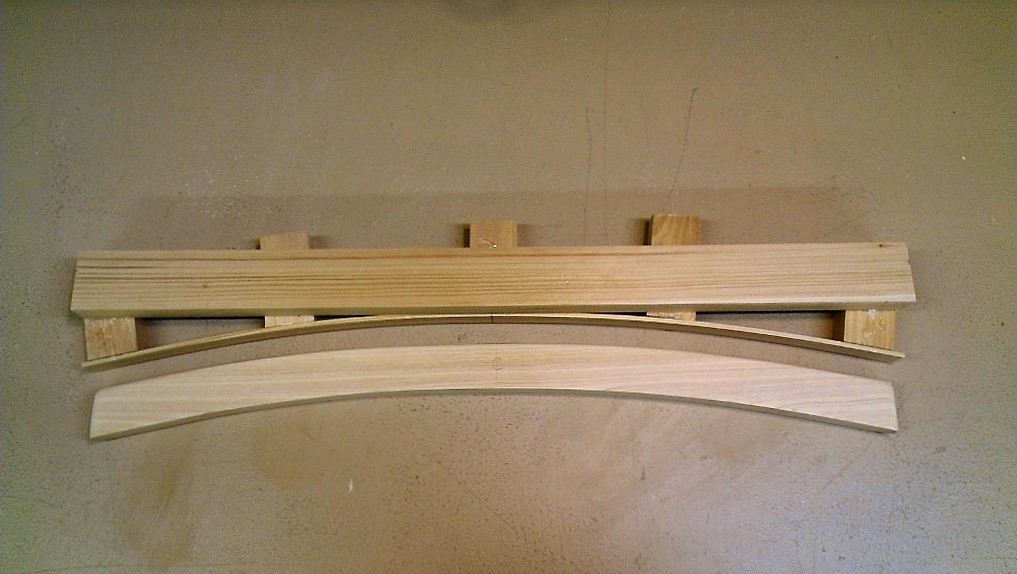 Traced curves cut with bandsaw and sanded smooth