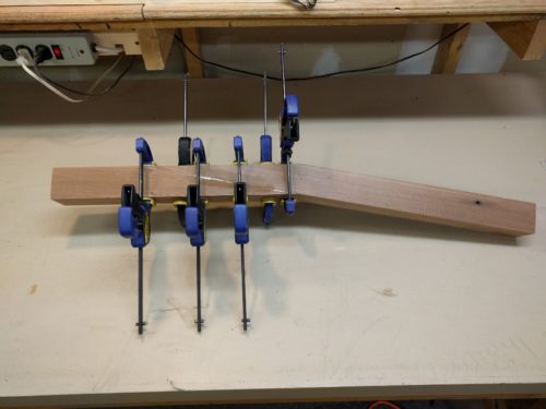 Back legs formed via scarf joinery