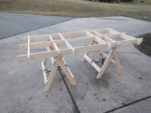 Portable plywood cutting table supports a full sheet of plywood