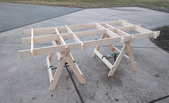 Portable plywood cutting table supports a full sheet of plywood